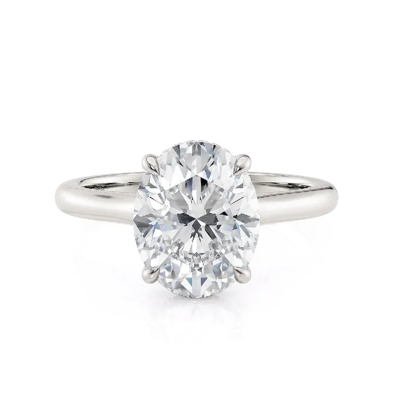 engagement rings with a modern twist for women-0.08ctw Oval-Cut Hidden Halo Diamond Solitaire