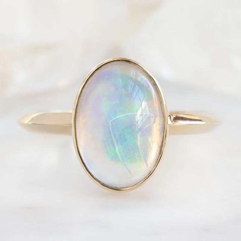 heart shaped engagement rings for women-The Hazel Ring | 1.97ct Oval Opal in 14K Yellow Gold