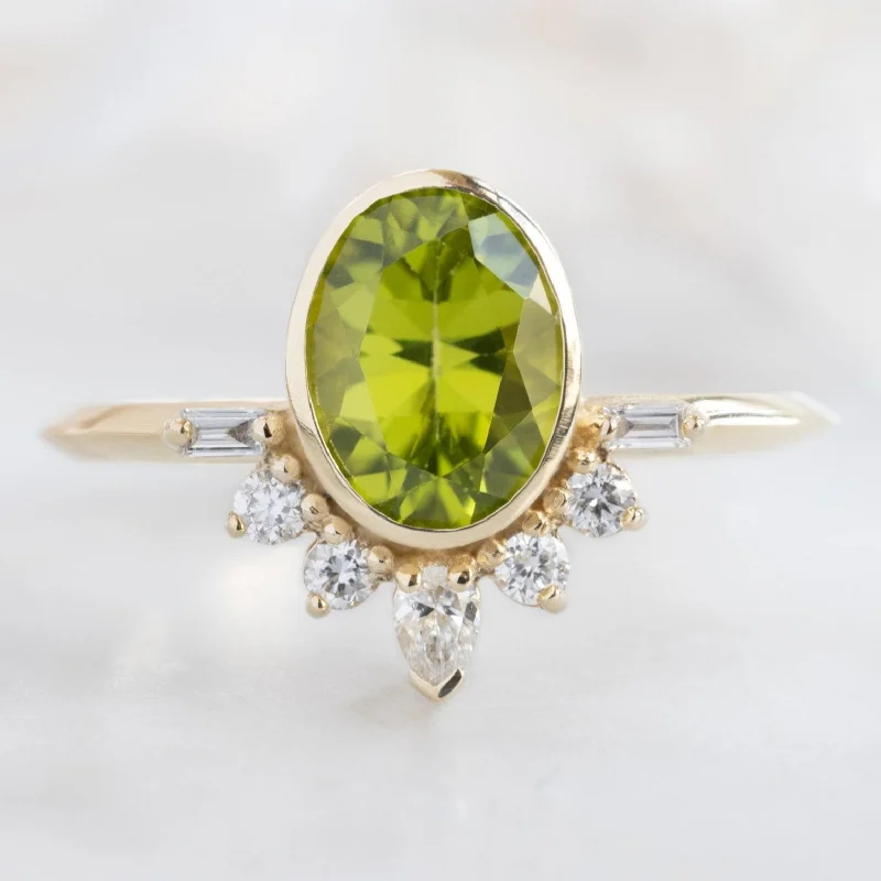 engagement rings with intricate designs for women-The Posy Ring | 1.36ct Oval Peridot in 14K Yellow Gold