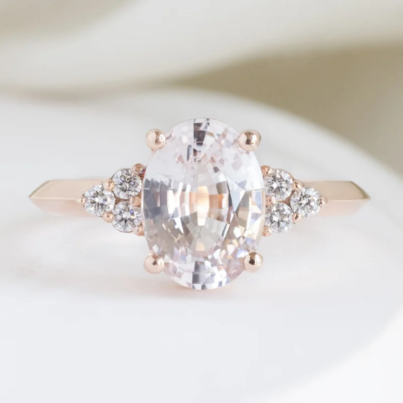 affordable vintage engagement rings for women-The Ivy Luxe | 2.12ct Oval Peach Sapphire in 18K Rose Gold