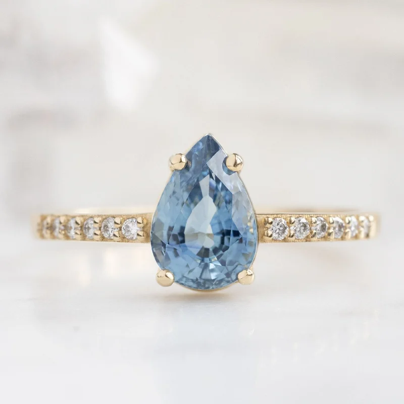 engagement rings with emeralds for women-The Willow Ring | 1.18ct Pear Blue Sapphire in 14K Yellow Gold