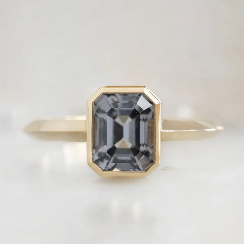 luxurious engagement rings for women-The Hazel Ring | 1.72ct Emerald Cut Spinel in 14K Yellow Gold