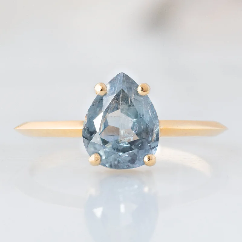 minimalist engagement rings for women-The Bryn Ring | 1.42ct Pear Cut Blue Sapphire in 14K Yellow Gold