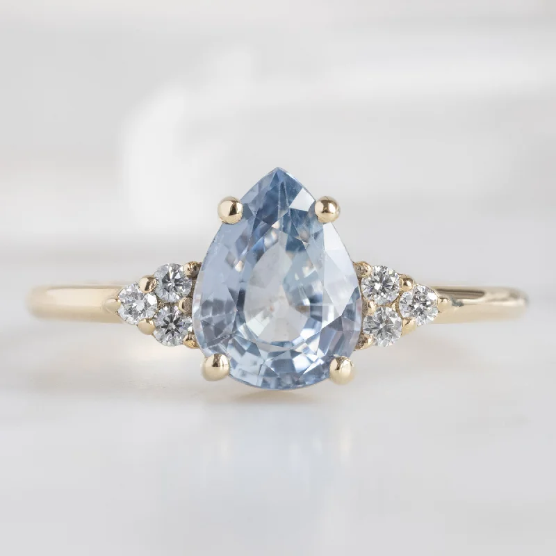 luxury solitaire engagement rings for women-The Ivy Ring | 1.5ct Pear Cut Sapphire in 14K Yellow Gold